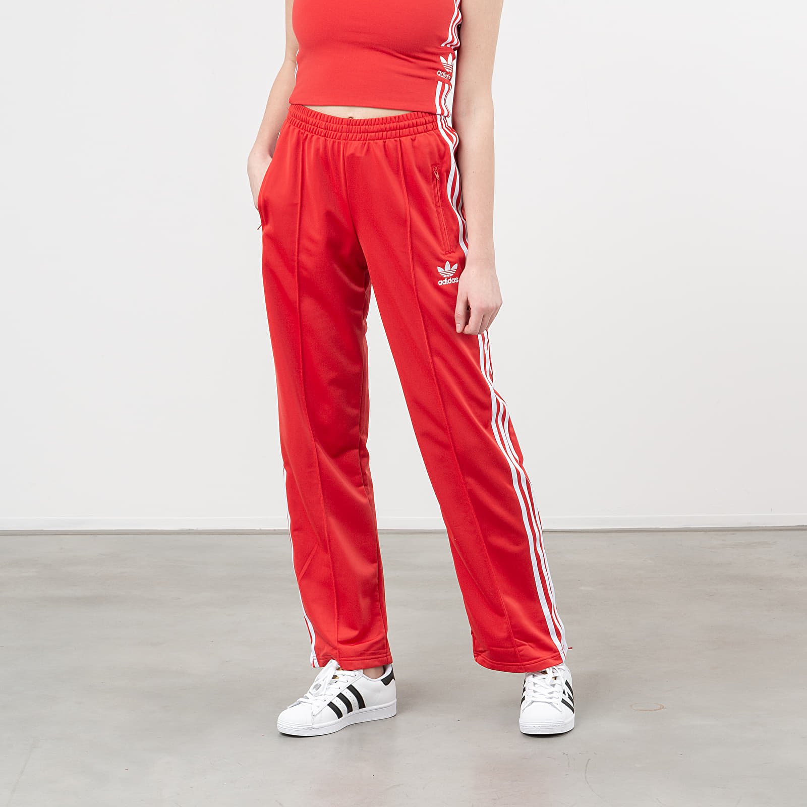 Pants and jeans adidas Firebird Trackpants Lush Red White Footshop
