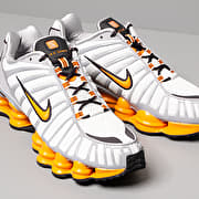 Orange and white nike top shox