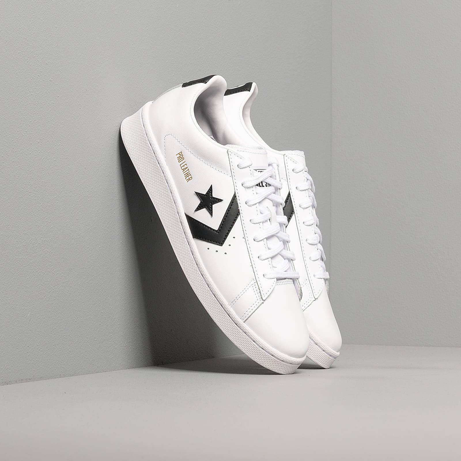 Converse white sales and gold leather