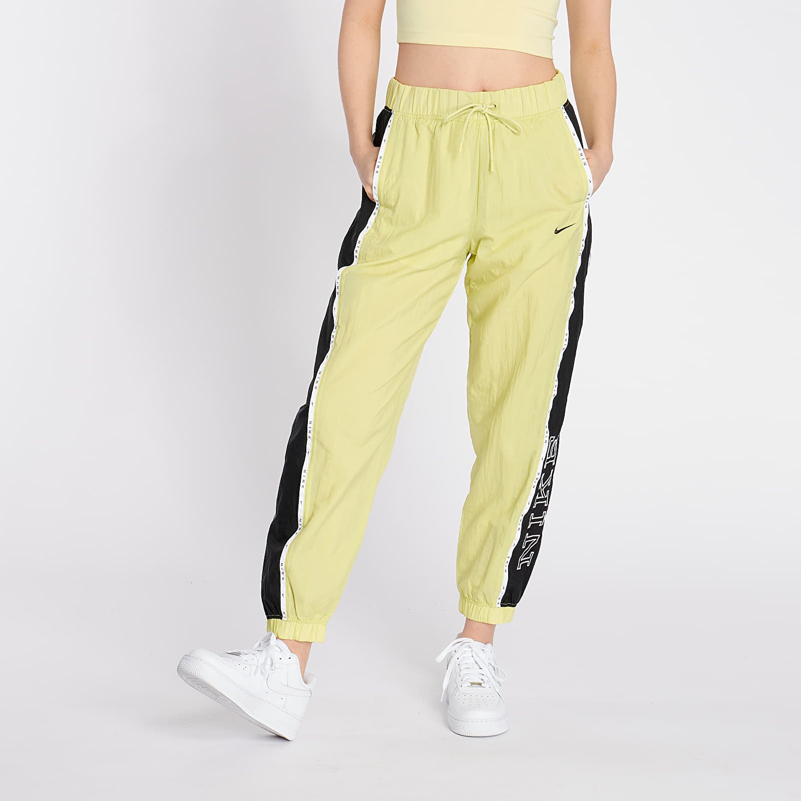 Pantaloni și blugi Nike Sportswear Woven Piping Pants Limelight/ Black/ Black