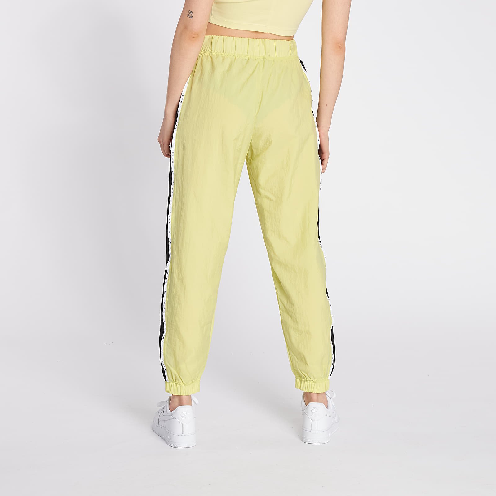 Pantalones Nike Sportswear Woven Piping Pants Limelight/ Black/ Black