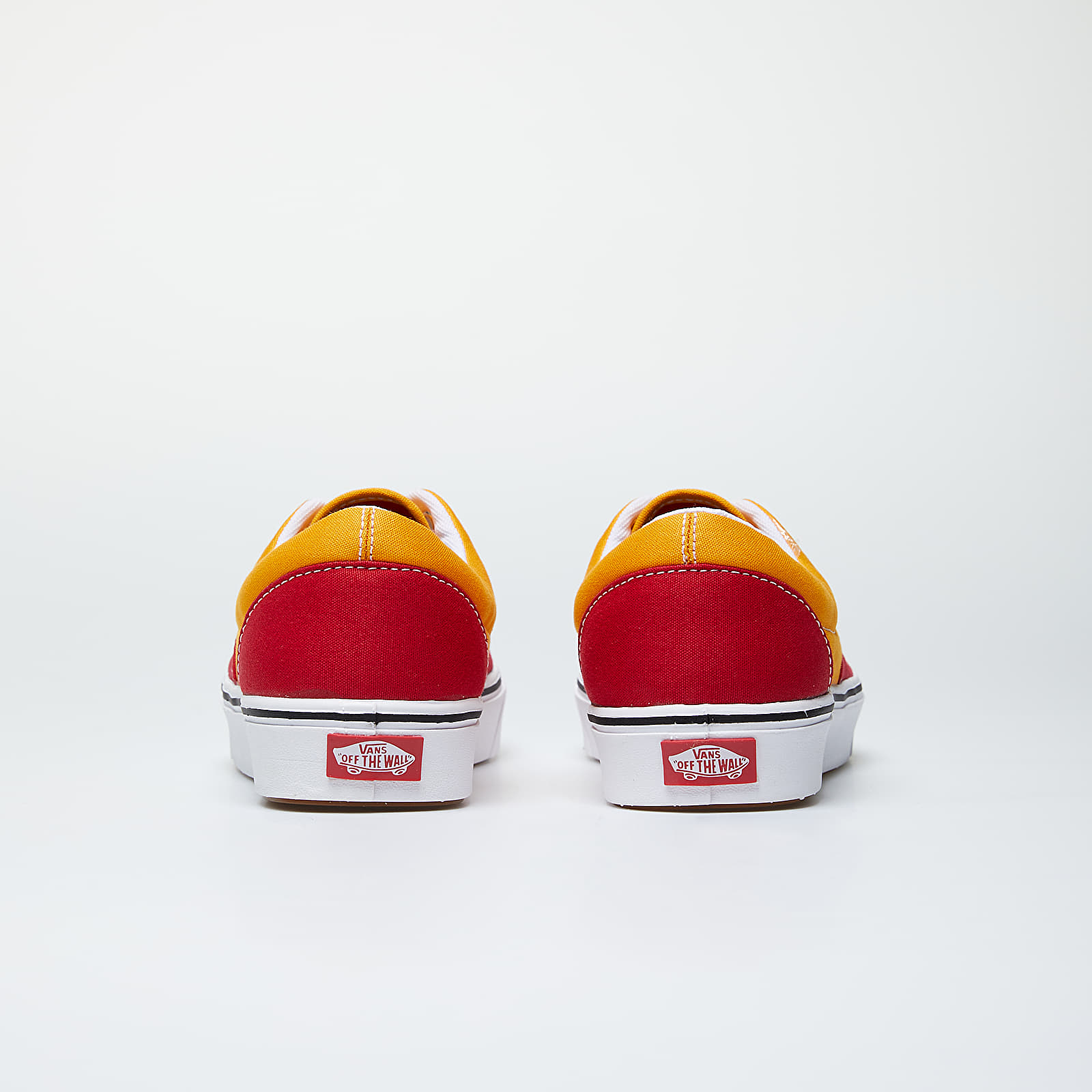 Yellow and cheap red vans