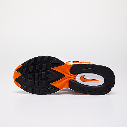 Nike triax women's running shoes discount