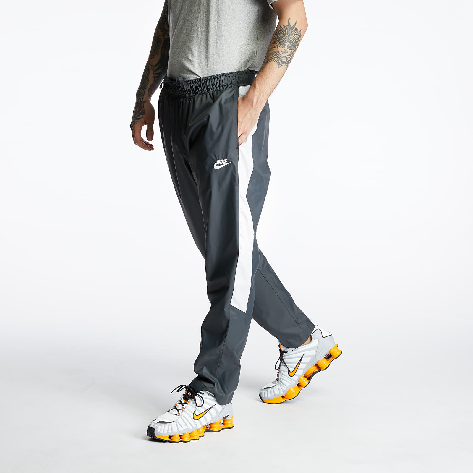 Pants and jeans Nike Sportswear Woven Core Track Pants Anthracite Vast Grey White Footshop