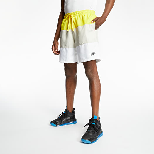 nike woven yellow shorts