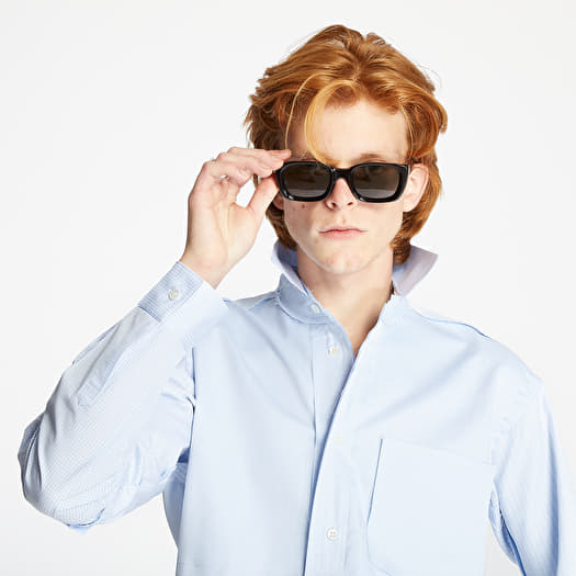 Sunglasses in shirt pocket store