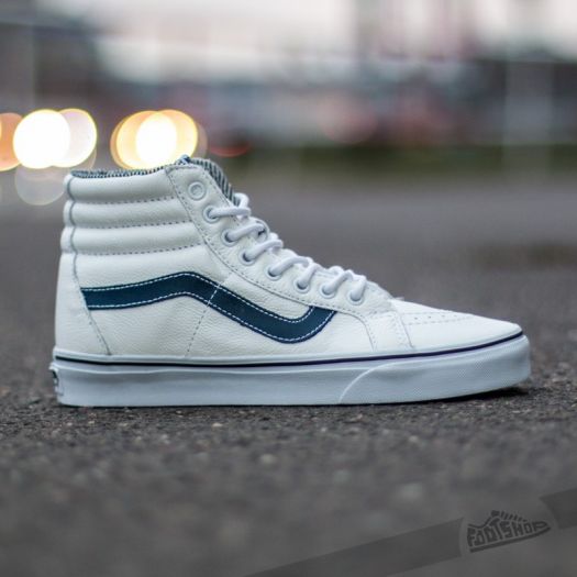 White high top vans with blue stripe top