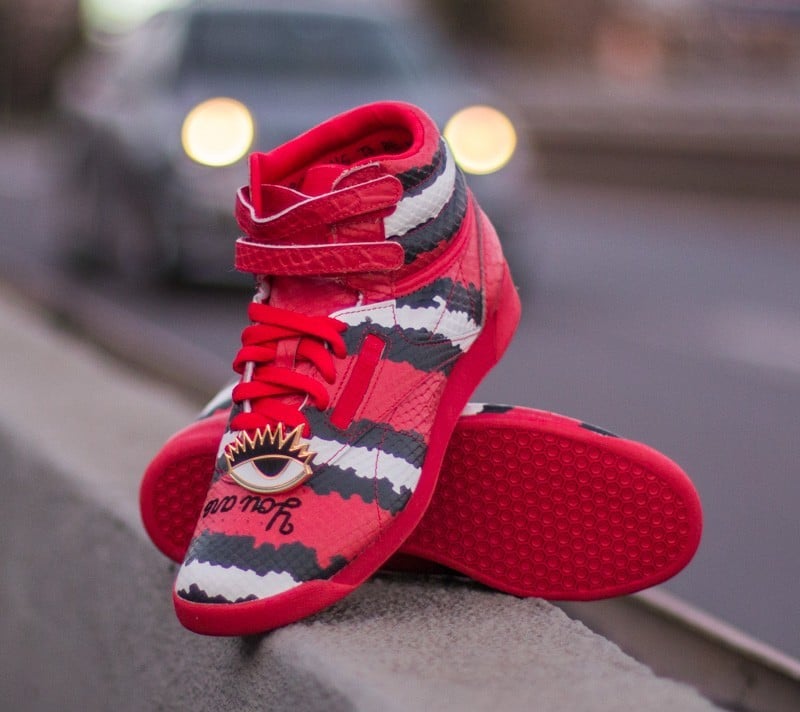Red hi top reeboks discount