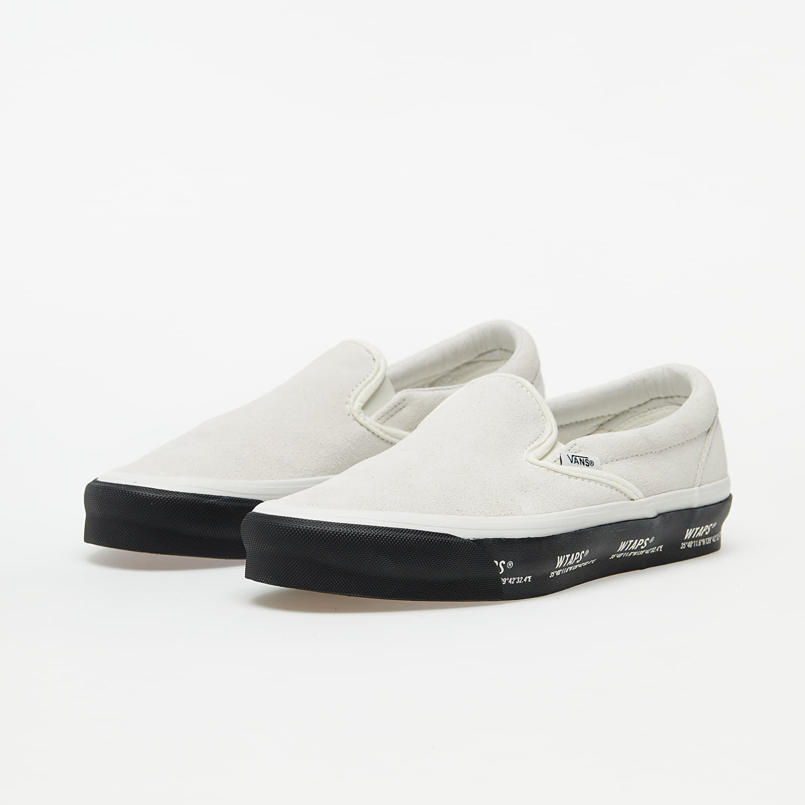 White slip on vans price online