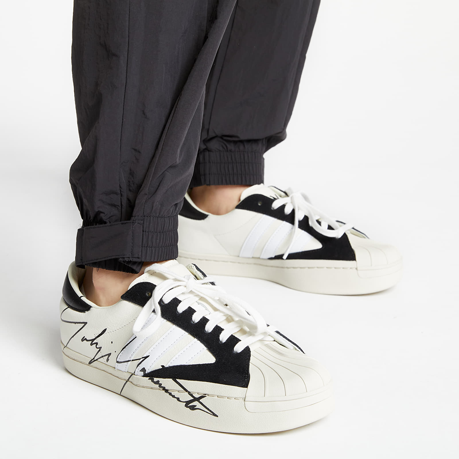 Nohavice adidas Pants Black/ Black/ Active Gold