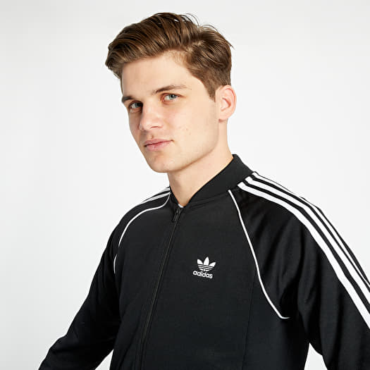 Adidas superstar black and white track top sales