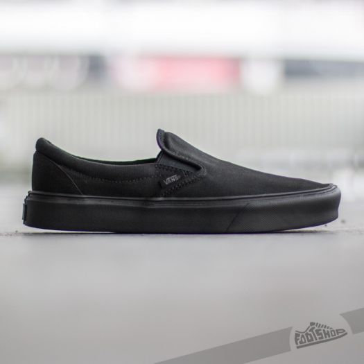 Black canvas vans slip on 2025