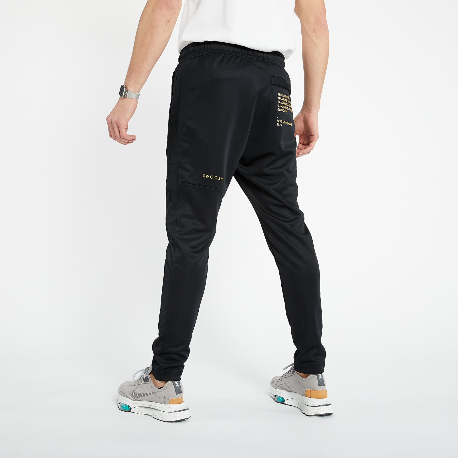 Nike metallic pants shop