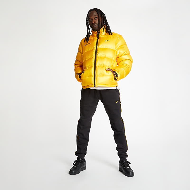 Nike x Drake Nocta NRG Au Puffer Jacket University Gold | Footshop