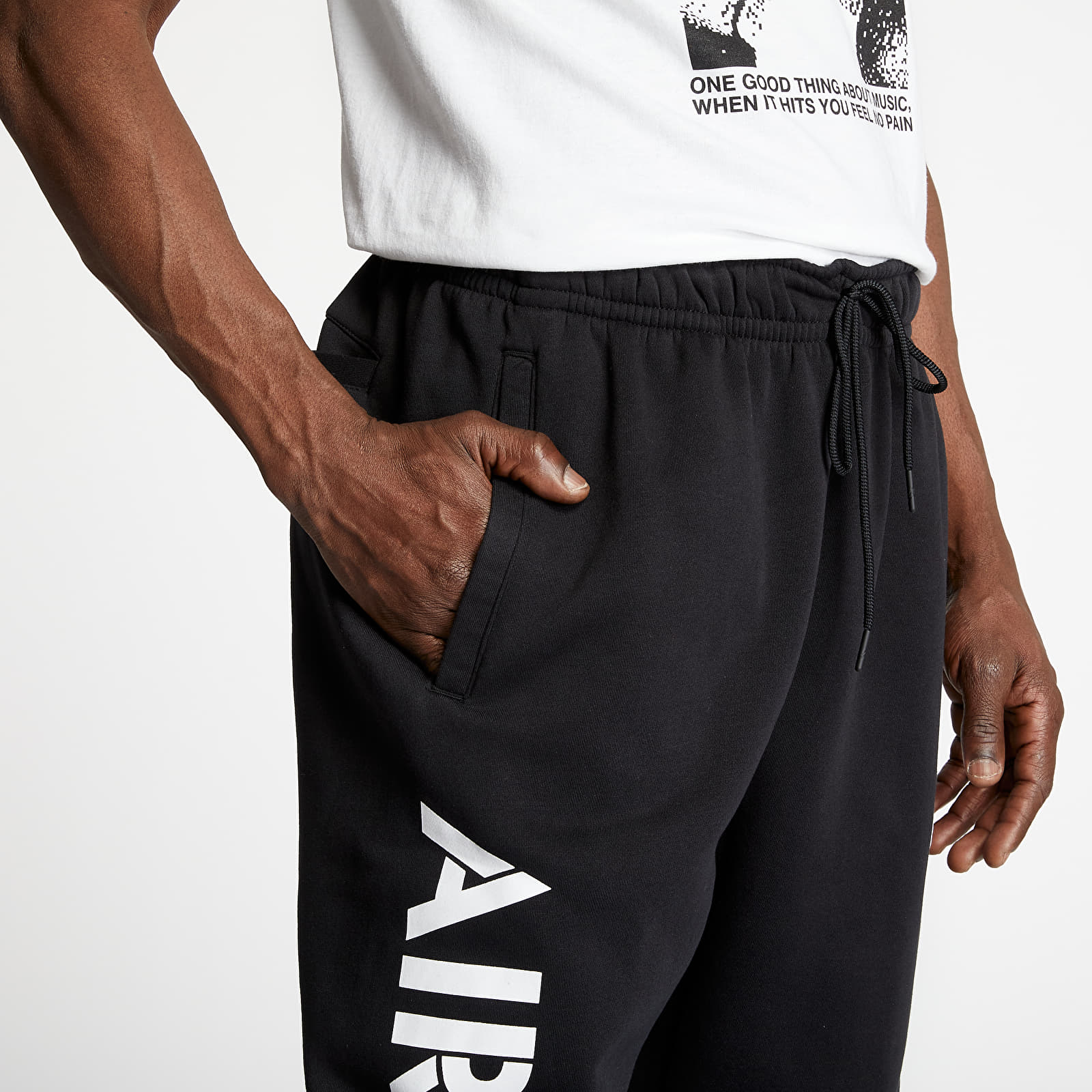 Pants and jeans Jordan AJ4 Graphic Fleece Pants Black/ University Red