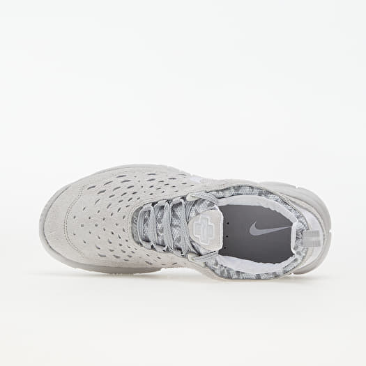 Nike free uomo argento sale