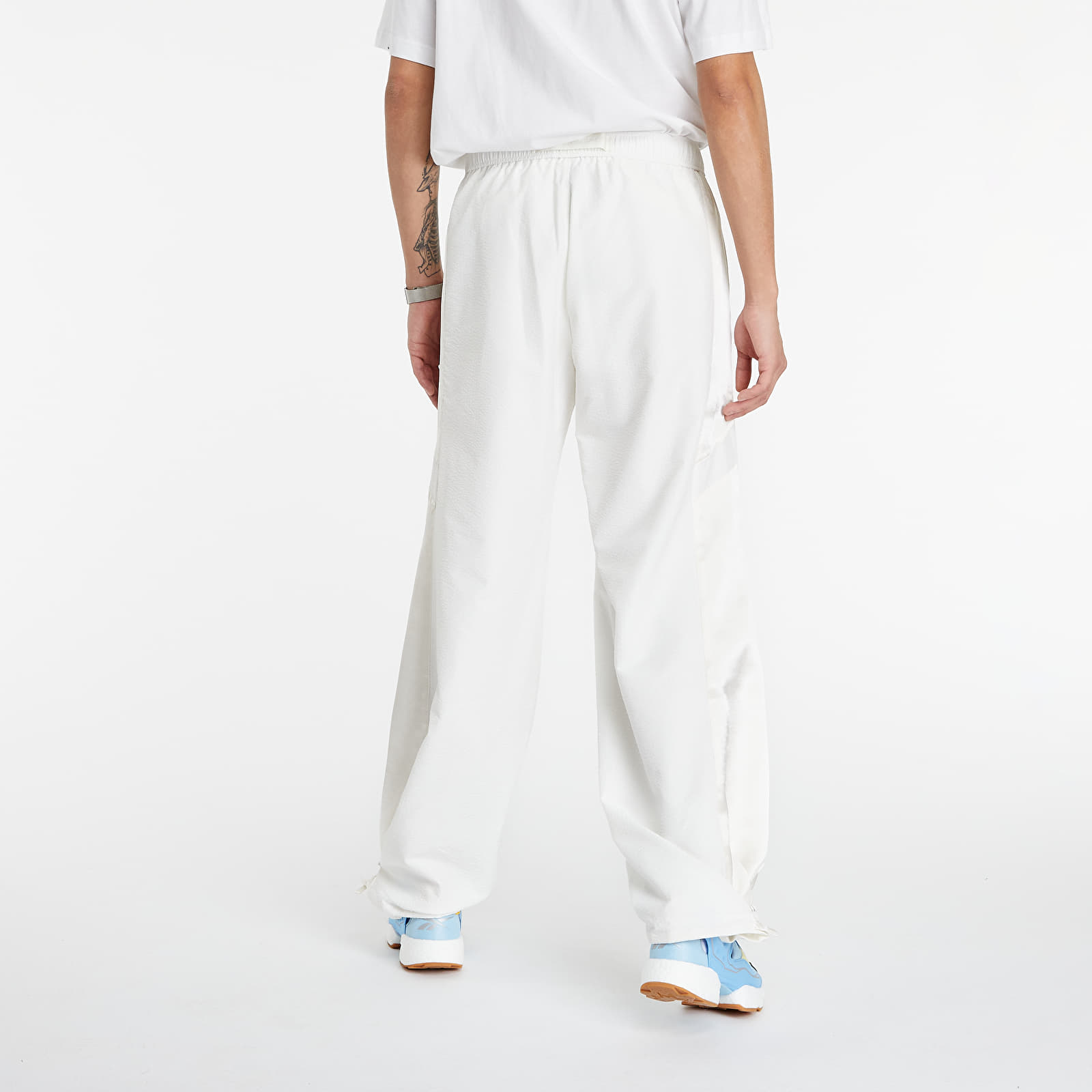 Дънки и панталони Reebok R&C Woven Pants Chalk