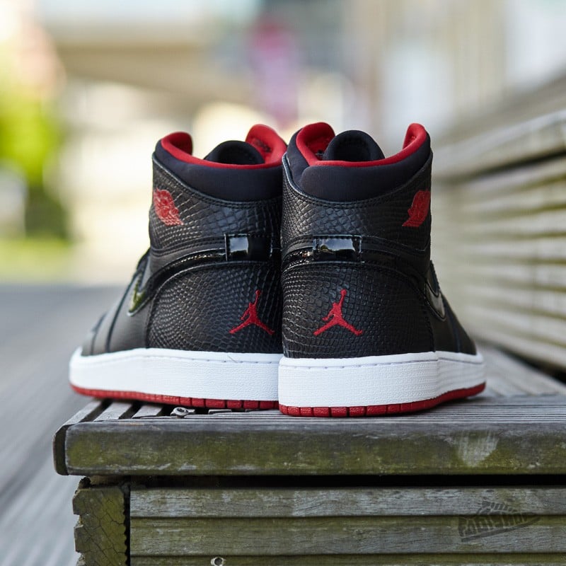 Red white and black best sale womens jordans