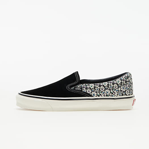 Vans store black slipons