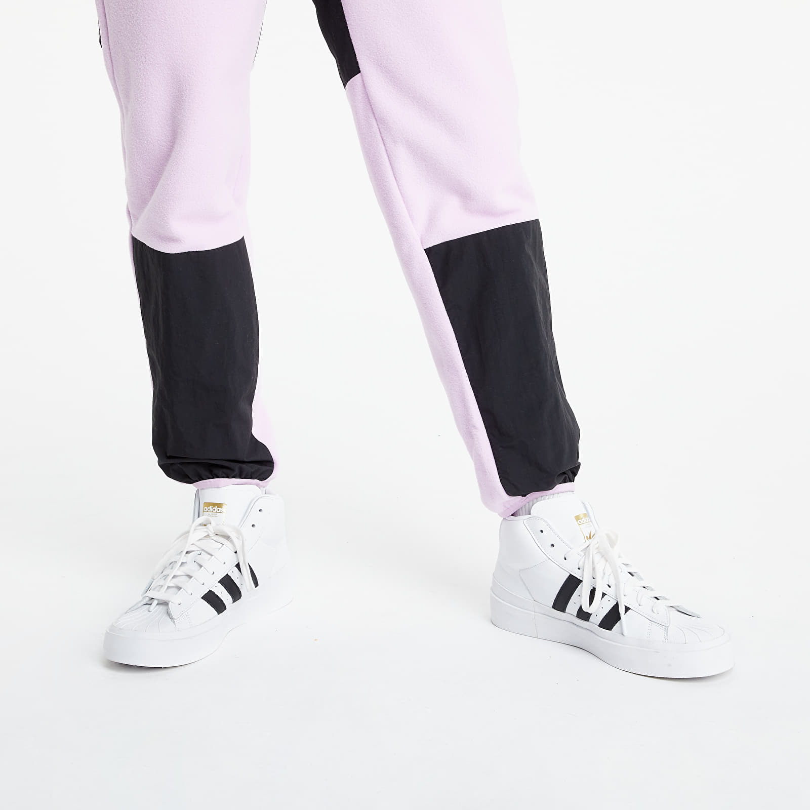 Pants and jeans adidas Originals Adventure Polar Fleece Colorblock Sweat  Pants Clear Lilac/ Black | Footshop