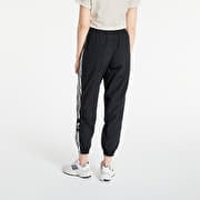 Adidas originals adicolor locked up logo track pants in black sale