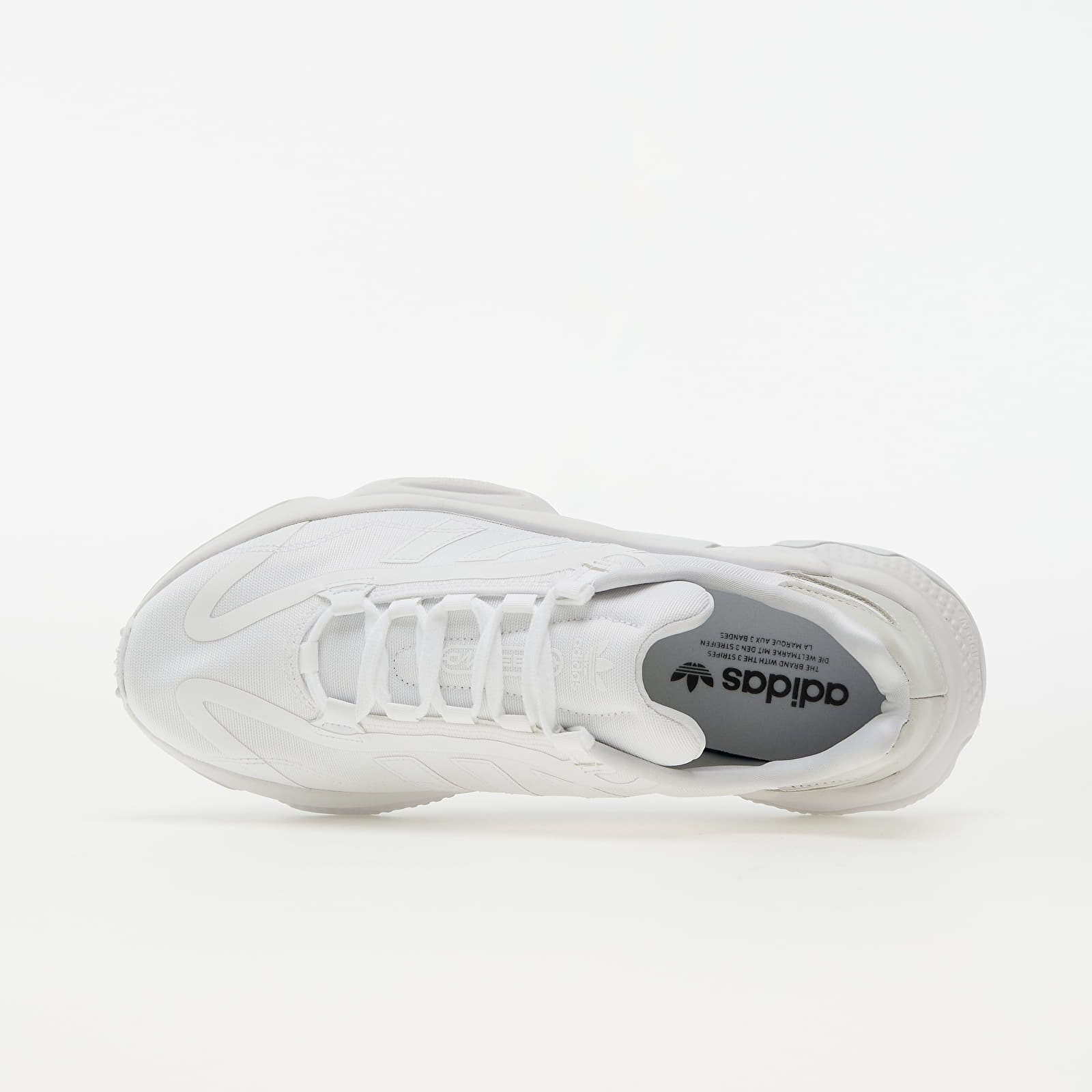 Triple white ozweego deals