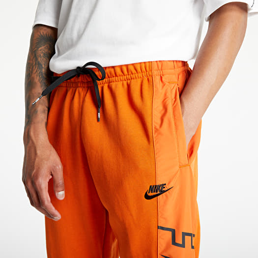 Pants and jeans Nike Sportswear Men\'s Joggers Campfire Orange/ Black |  Footshop