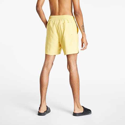White and gold nike shorts 2025