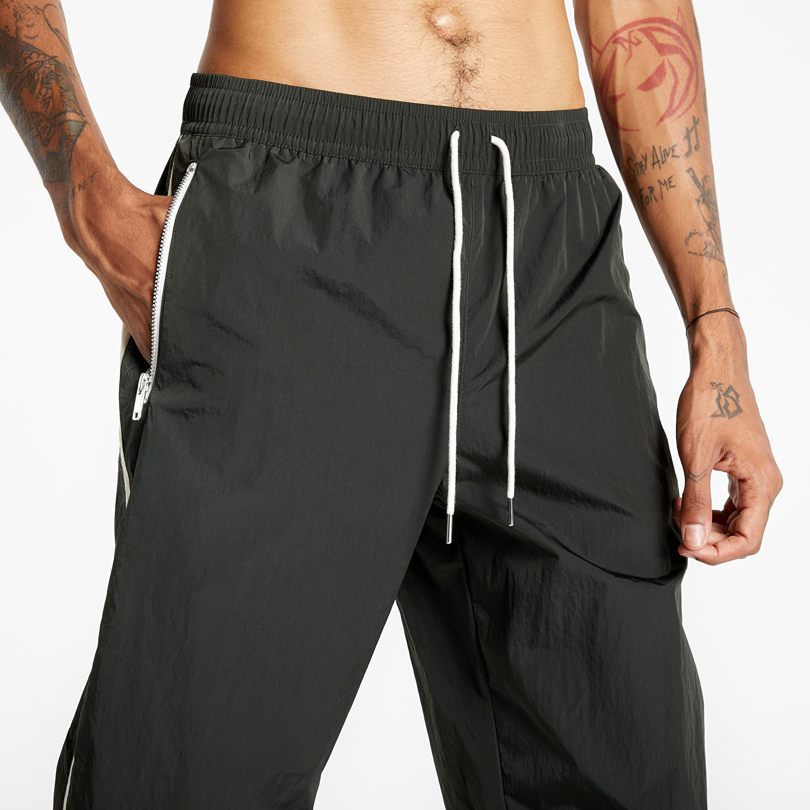 Pants and jeans Nike Sportswear Style Essentials Men s Unlined Woven Track Pants Sequoia Sail Ice Silver Sequoia Footshop