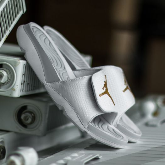 White and gold jordan slides sales