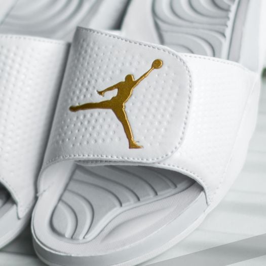 White and gold jordan slides discount