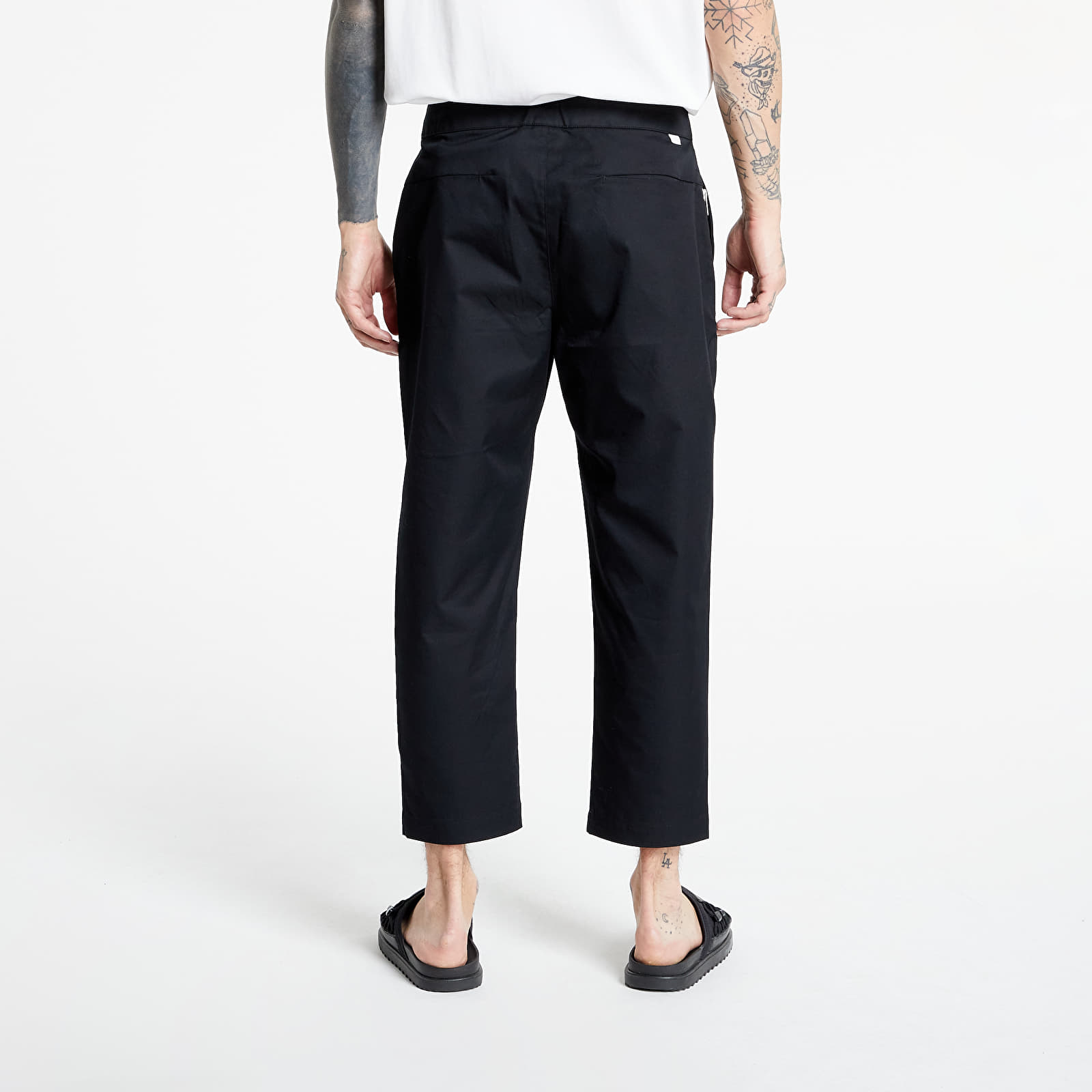 Housut Nike Sportswear Style Essentials M Woven Unlined Sneaker Pants Black/ Sail/ Ice Silver/ Black