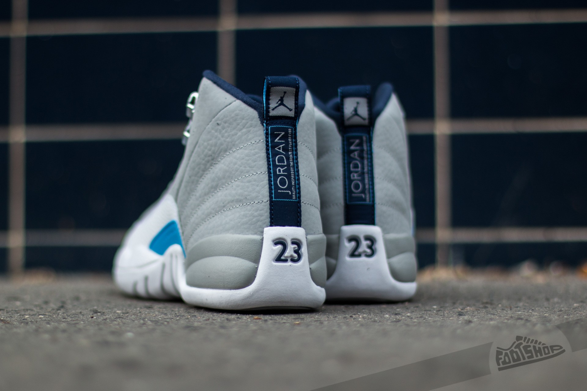 Jordan 12 grey deals university blue on feet