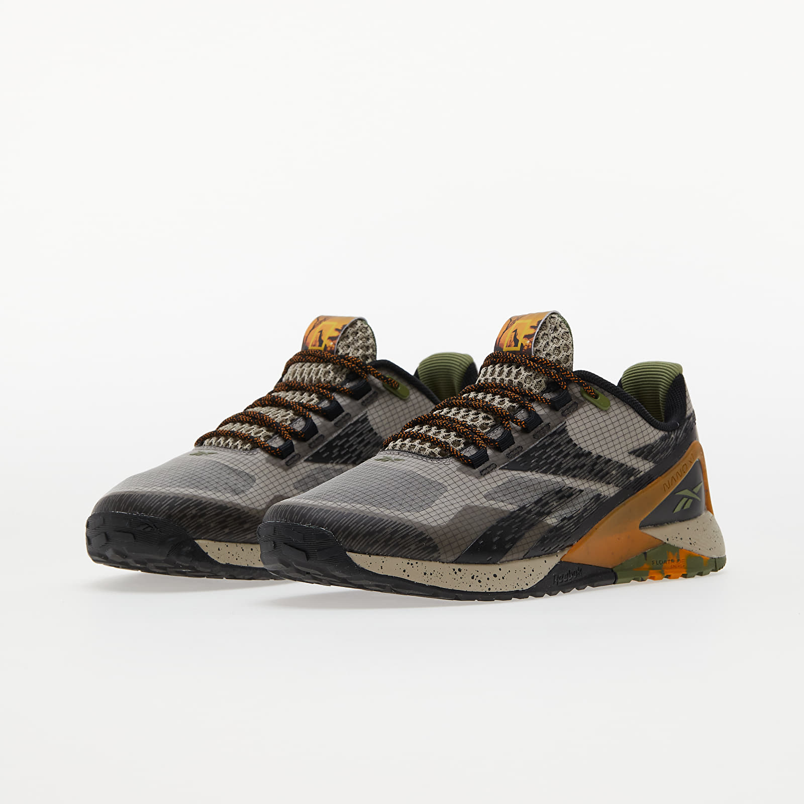 Herren Sneaker und Schuhe Reebok x National Geographic Nano X1 TR Adventure Light Sand/ Core Black/ Wast Green