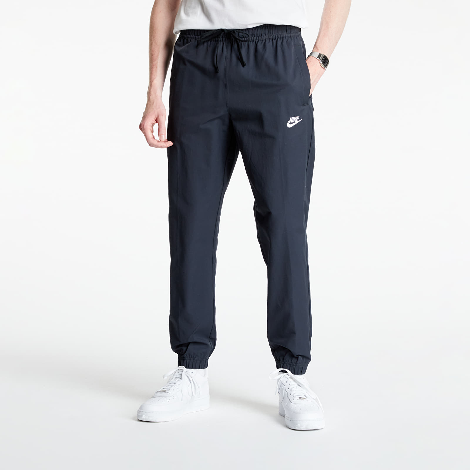 Pants and jeans Nike Sportswear Men s Unlined Cuff Pants Black White Footshop