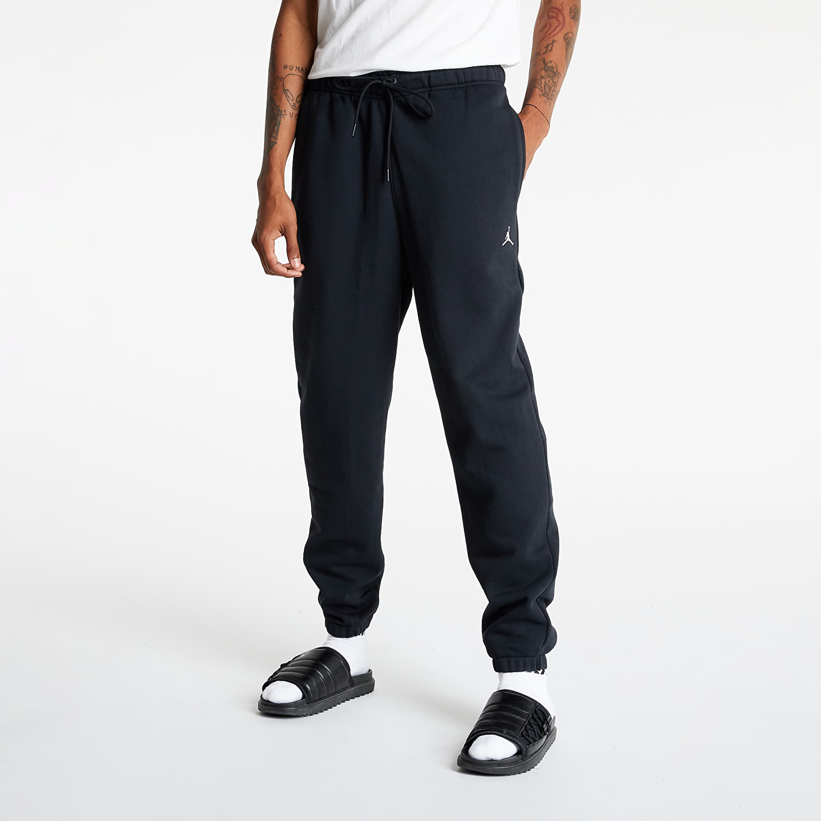 Pants and jeans Jordan Essentials Men s Fleece Pants Black Footshop