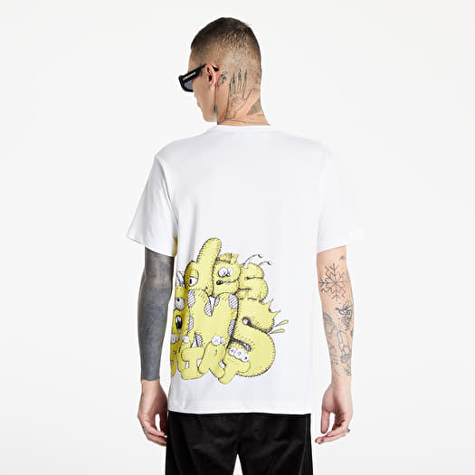 Magliette kaws sales