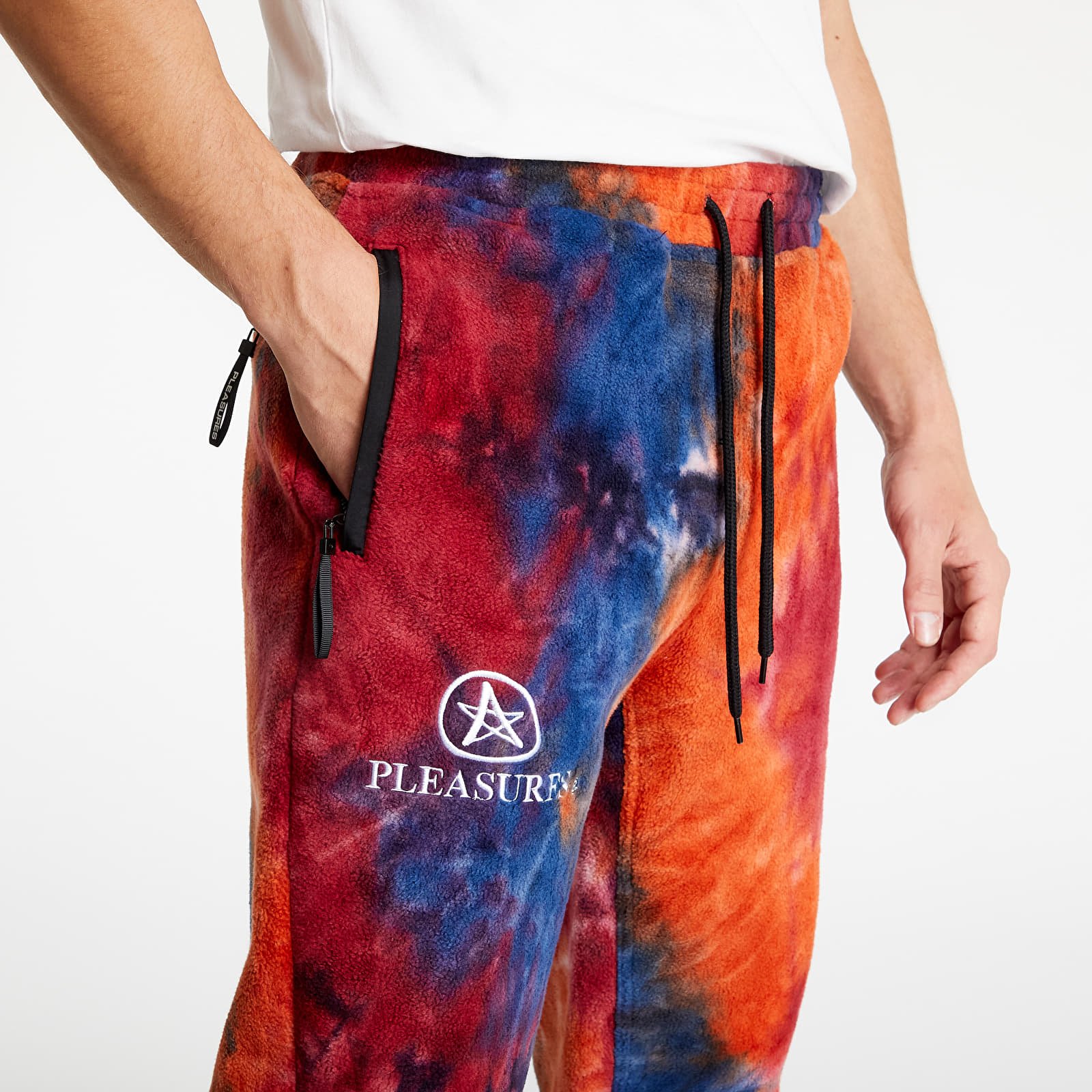Pleasures orange cheap track pants