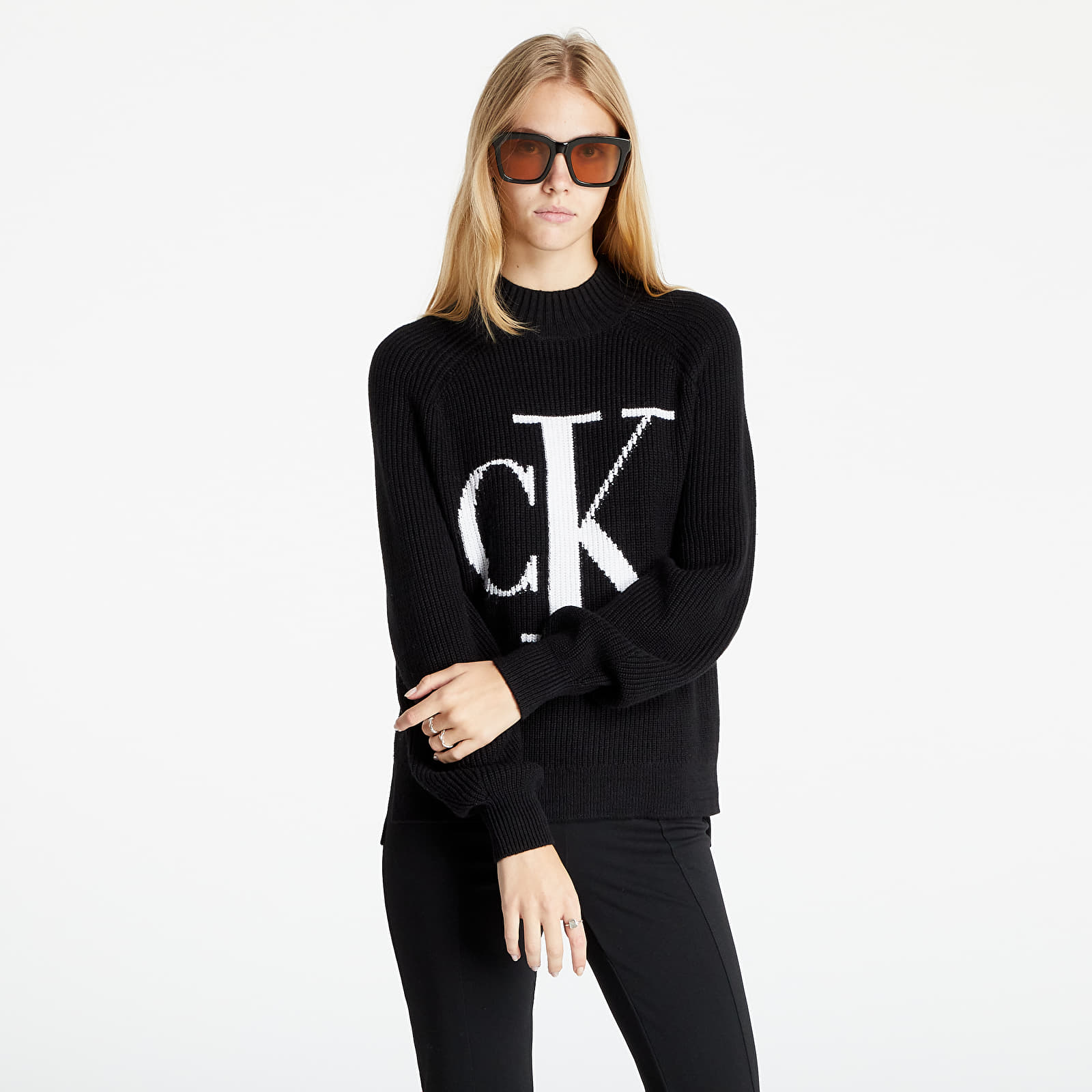 Calvin klein black 2024 and white sweater