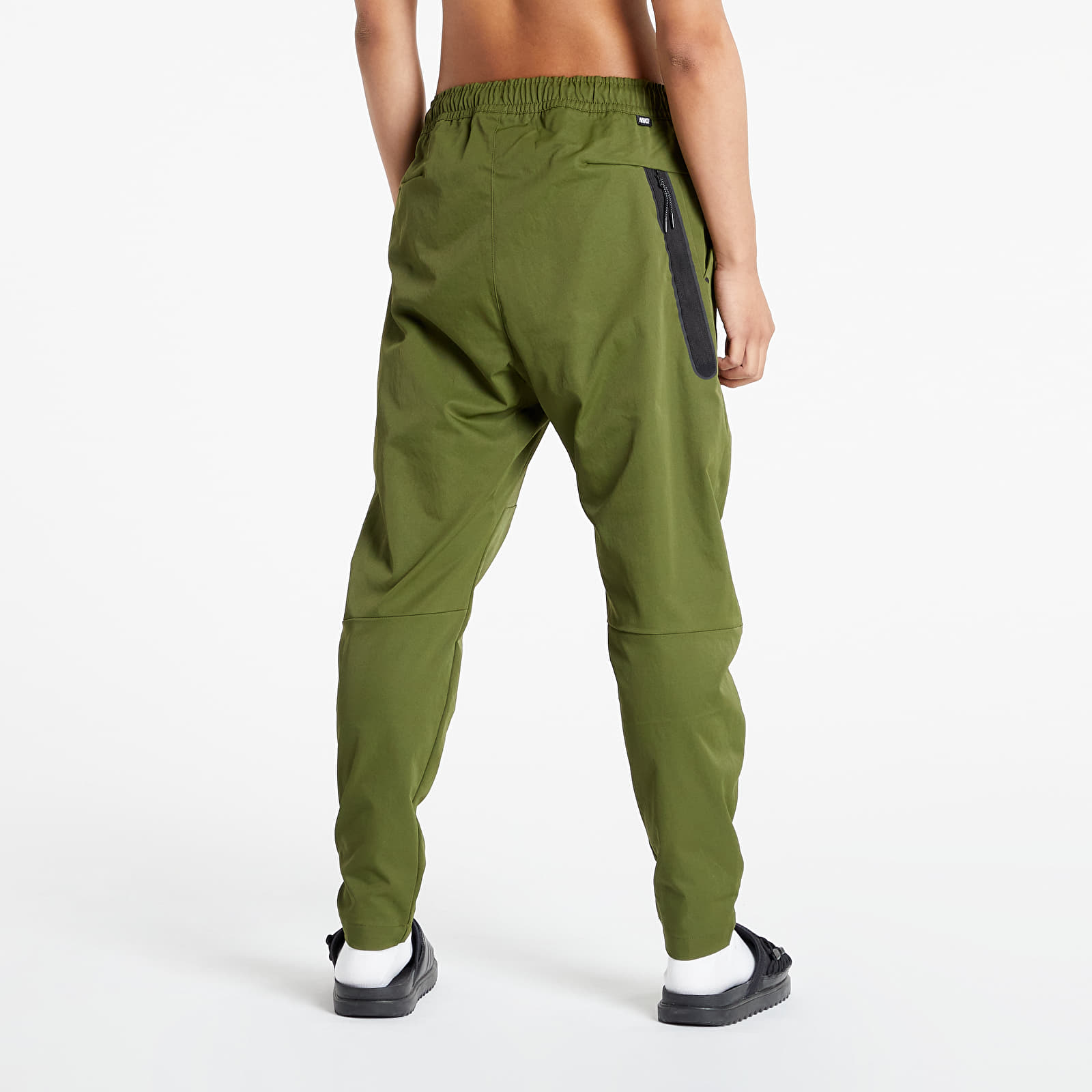 Spodnie Nike Sportswear M NSW Woven Ul Commuter Pant Rough Green