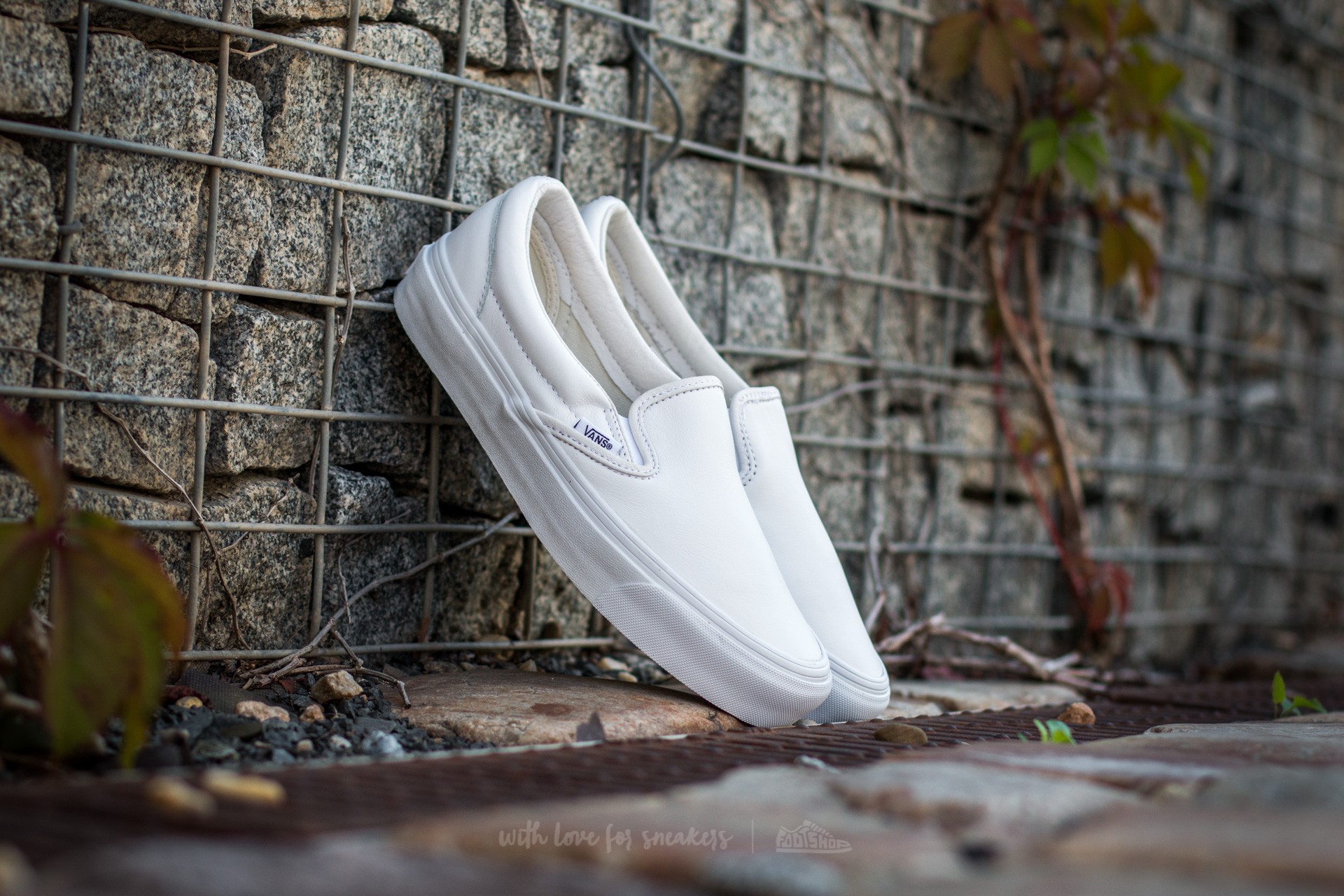 Vans triple white slip hot sale on