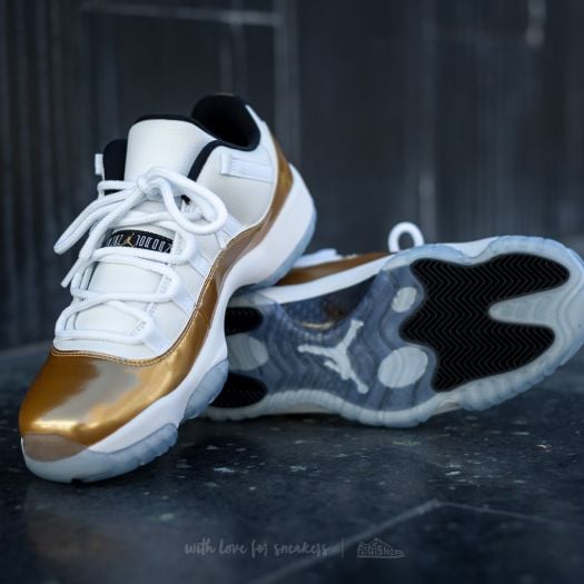 Gold jordan 11 on sale