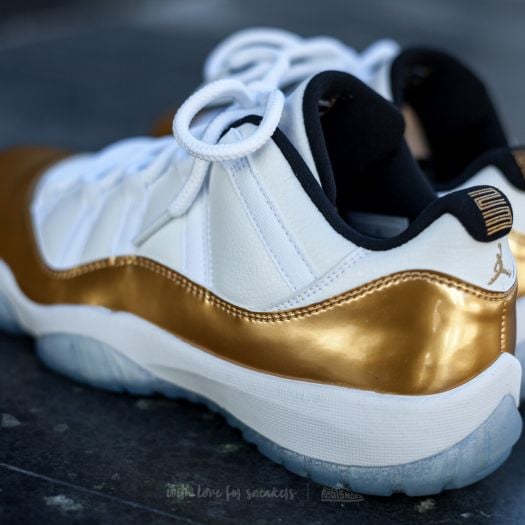 Gold jordan 11s on sale