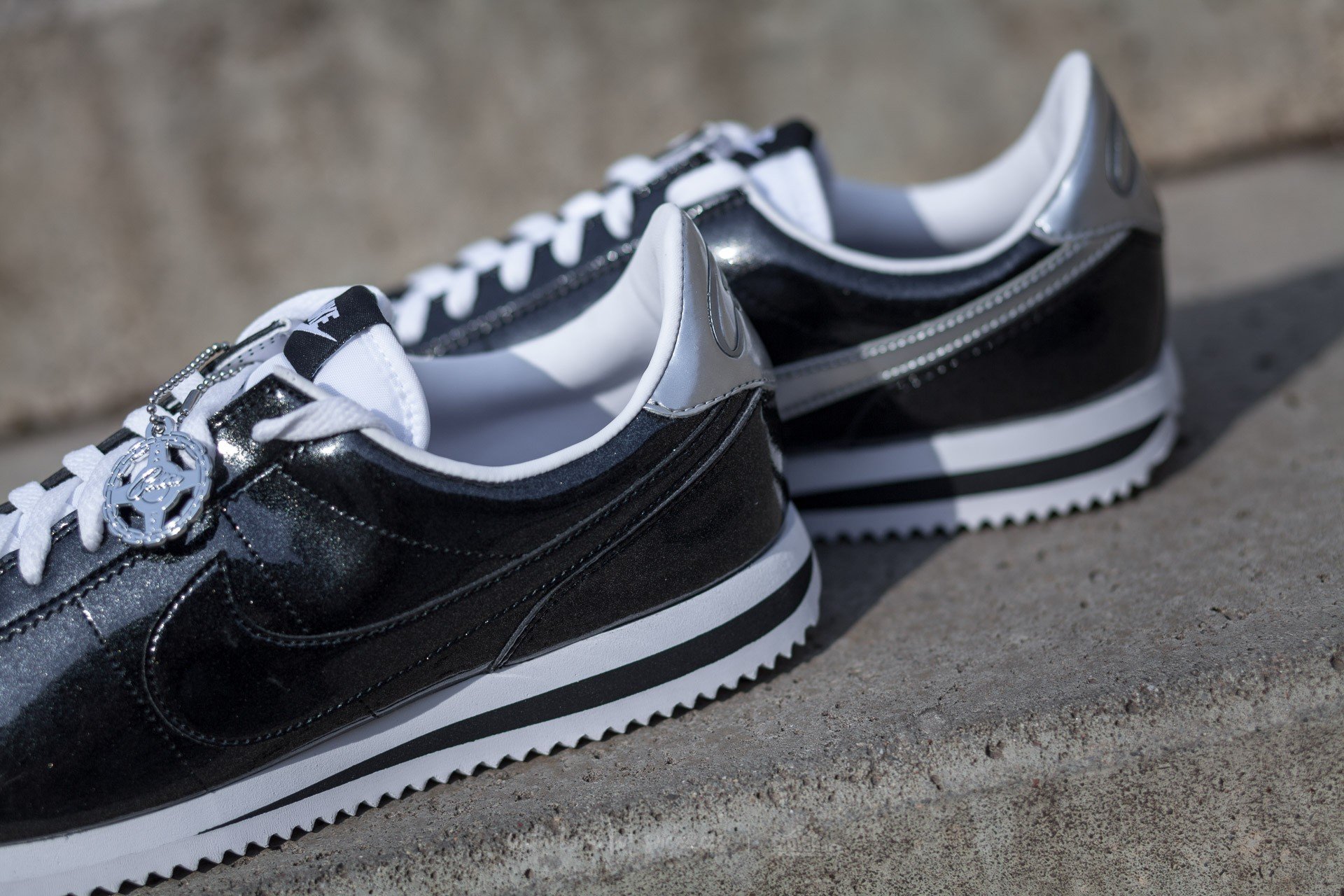 Black and 2025 silver nike cortez