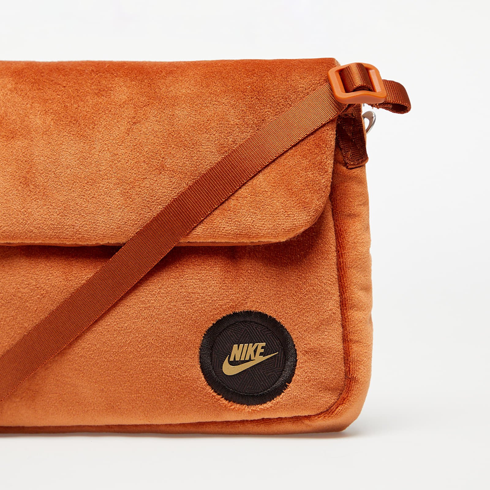 Nike rose hotsell gold sling bag