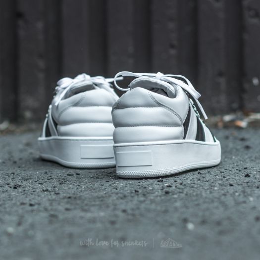 Black sneakers sale with white stripes