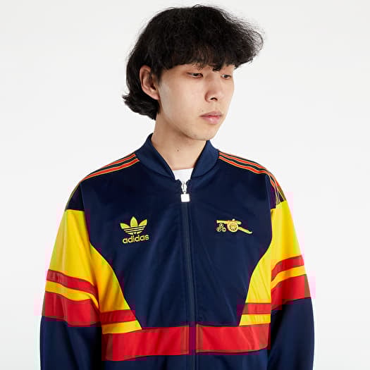 Yellow adidas tracksuit top deals