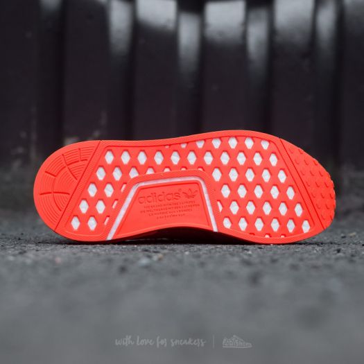 Adidas nmd red sole sale