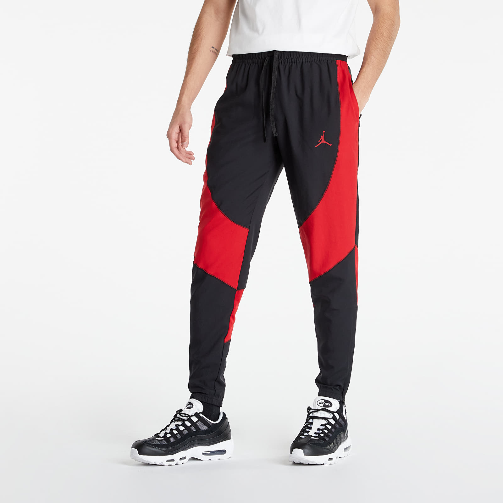 Džínsy a nohavice Jordan Dri-FIT Sport Woven Pant Black/ Gym Red/ Gym Red