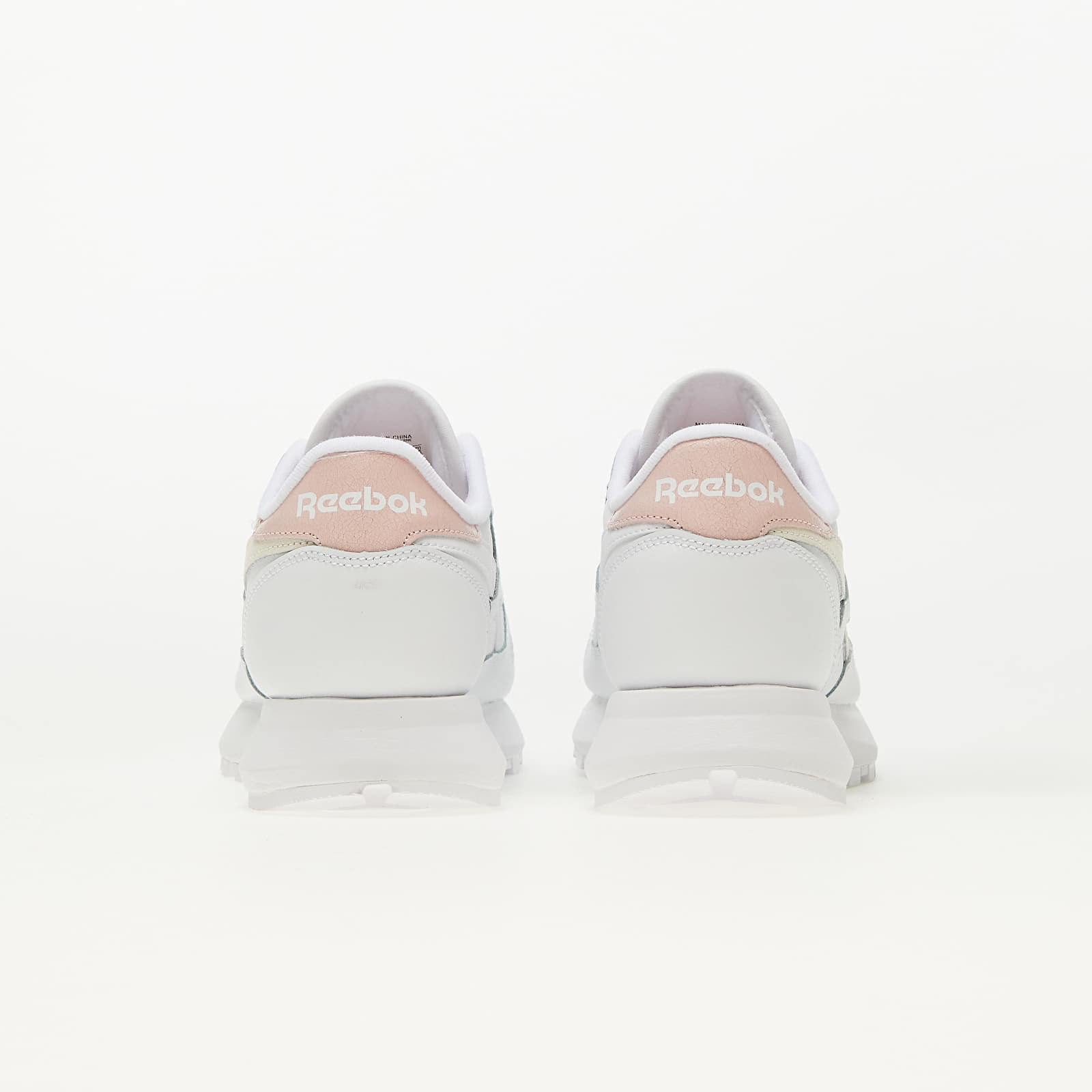 Reebok classic women's white and pink hotsell